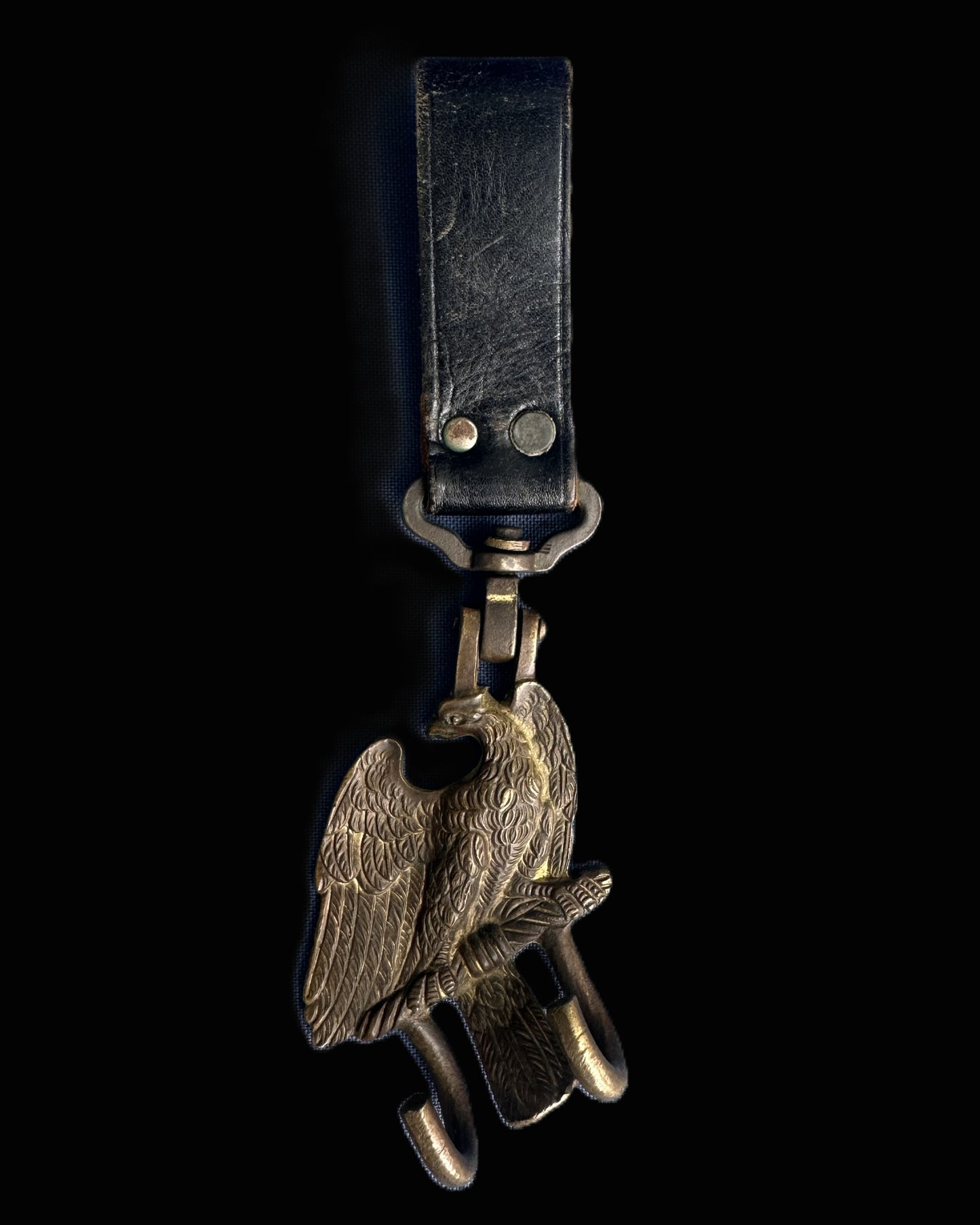 Imperial German Military Drum Hook – Stylized Eagle with Fasces, Mounted on Leather Strap