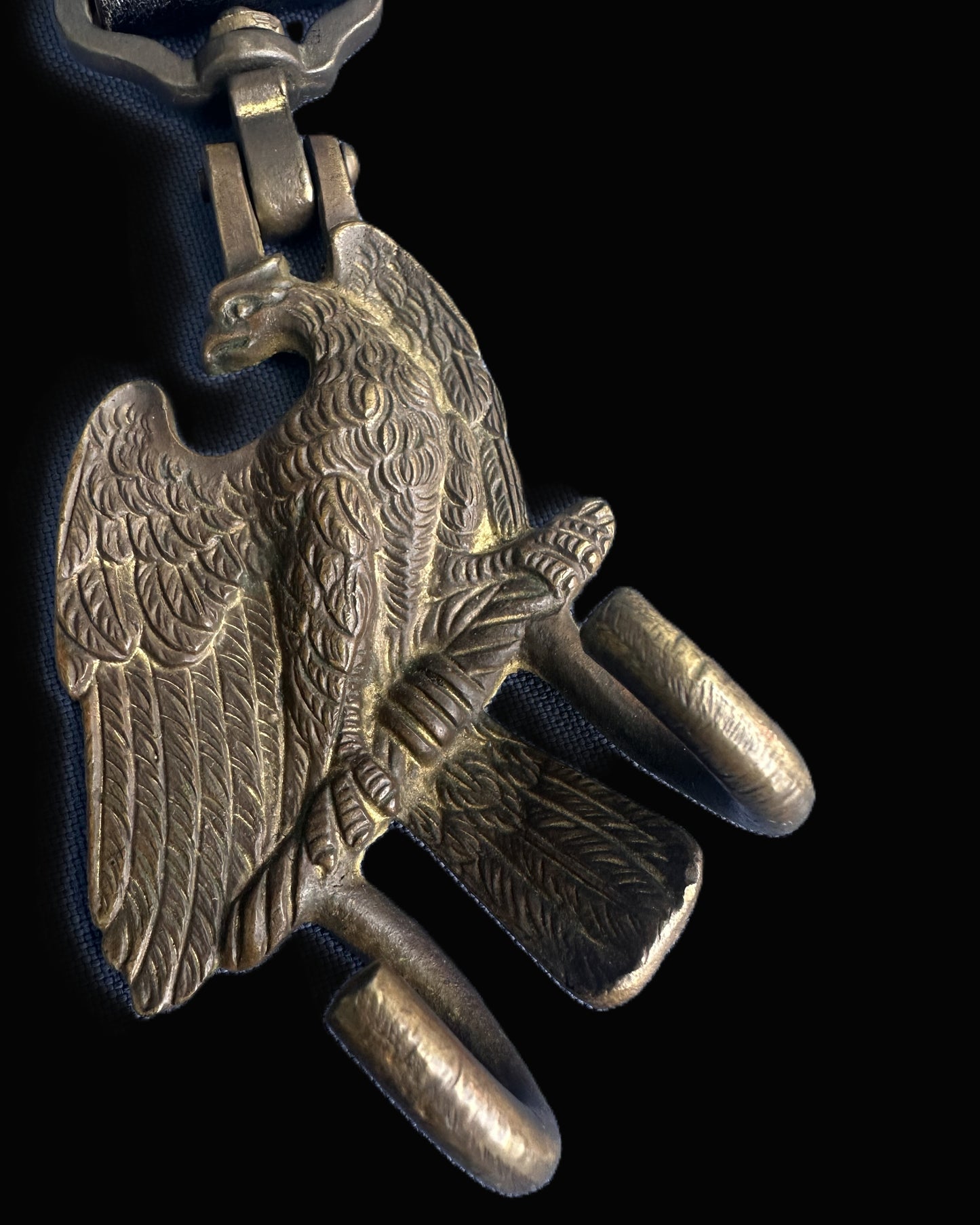 Imperial German Military Drum Hook – Stylized Eagle with Fasces, Mounted on Leather Strap