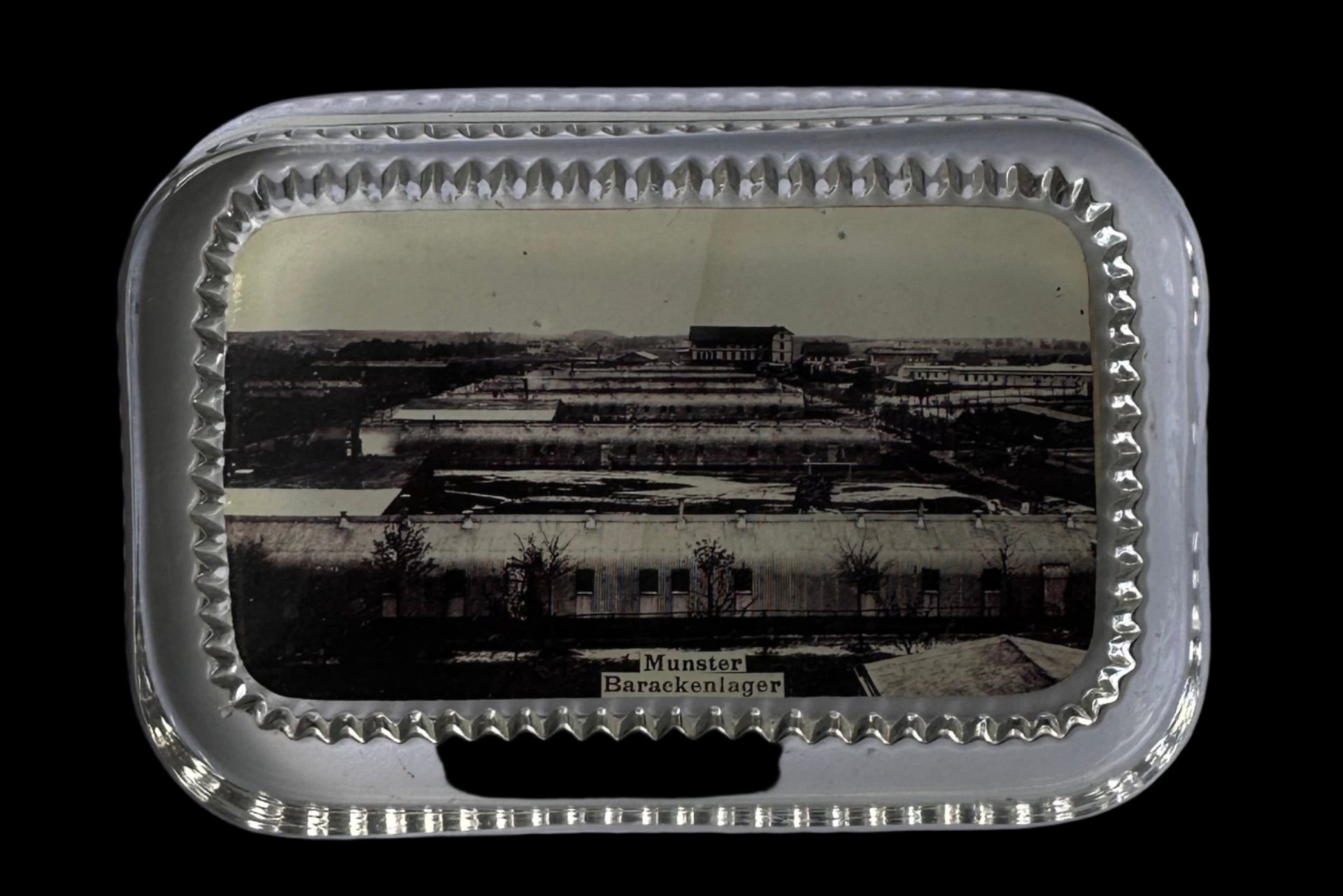 Glass souvenir paperweight featuring Munster Barackenlager military barracks
