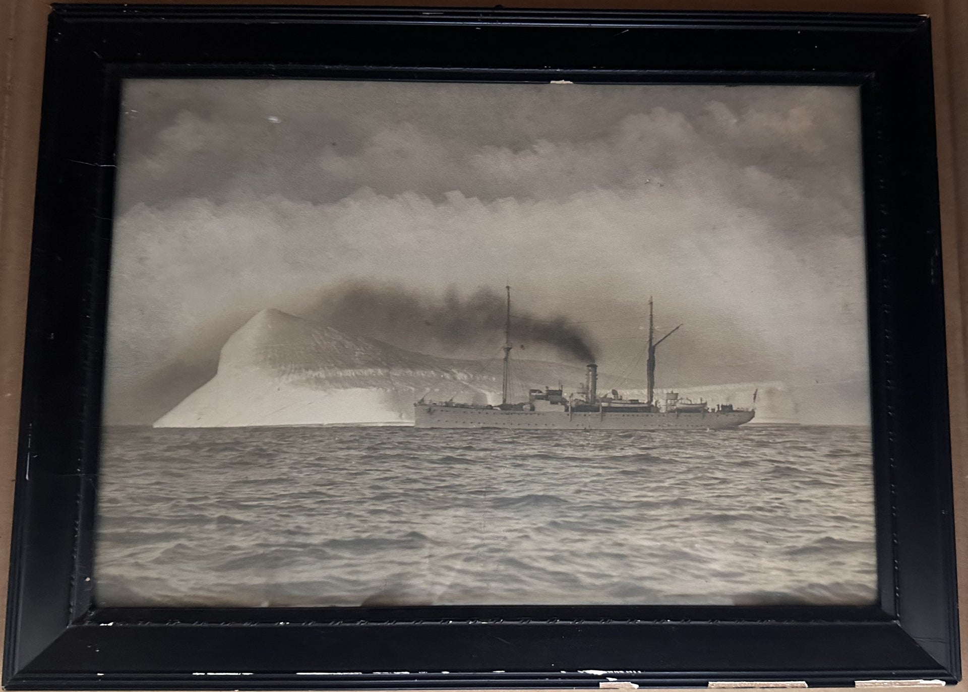 Framed Arctic Expedition Photograph Featuring Steamship and Iceberg