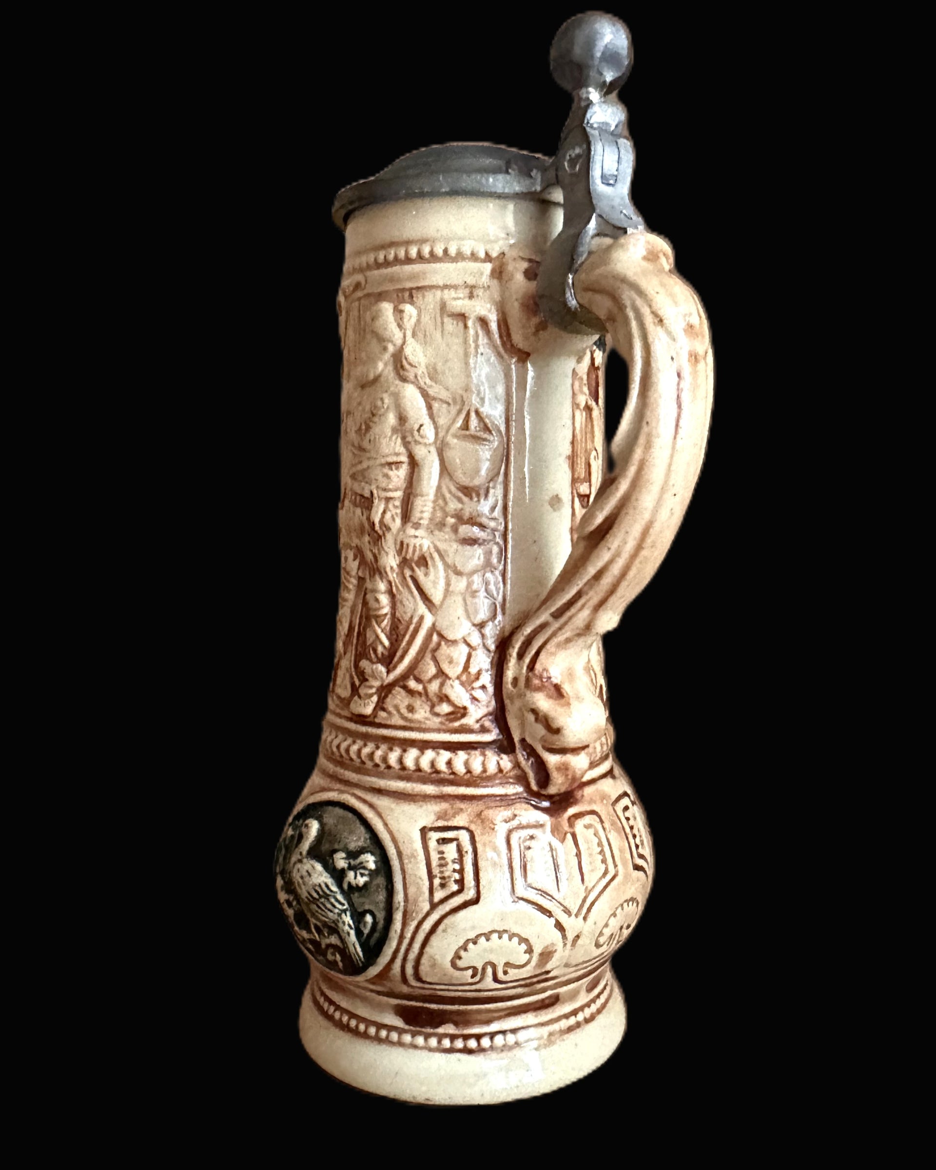 Antique German Beer Stein Featuring Mythological Reliefs and Pewter Lid