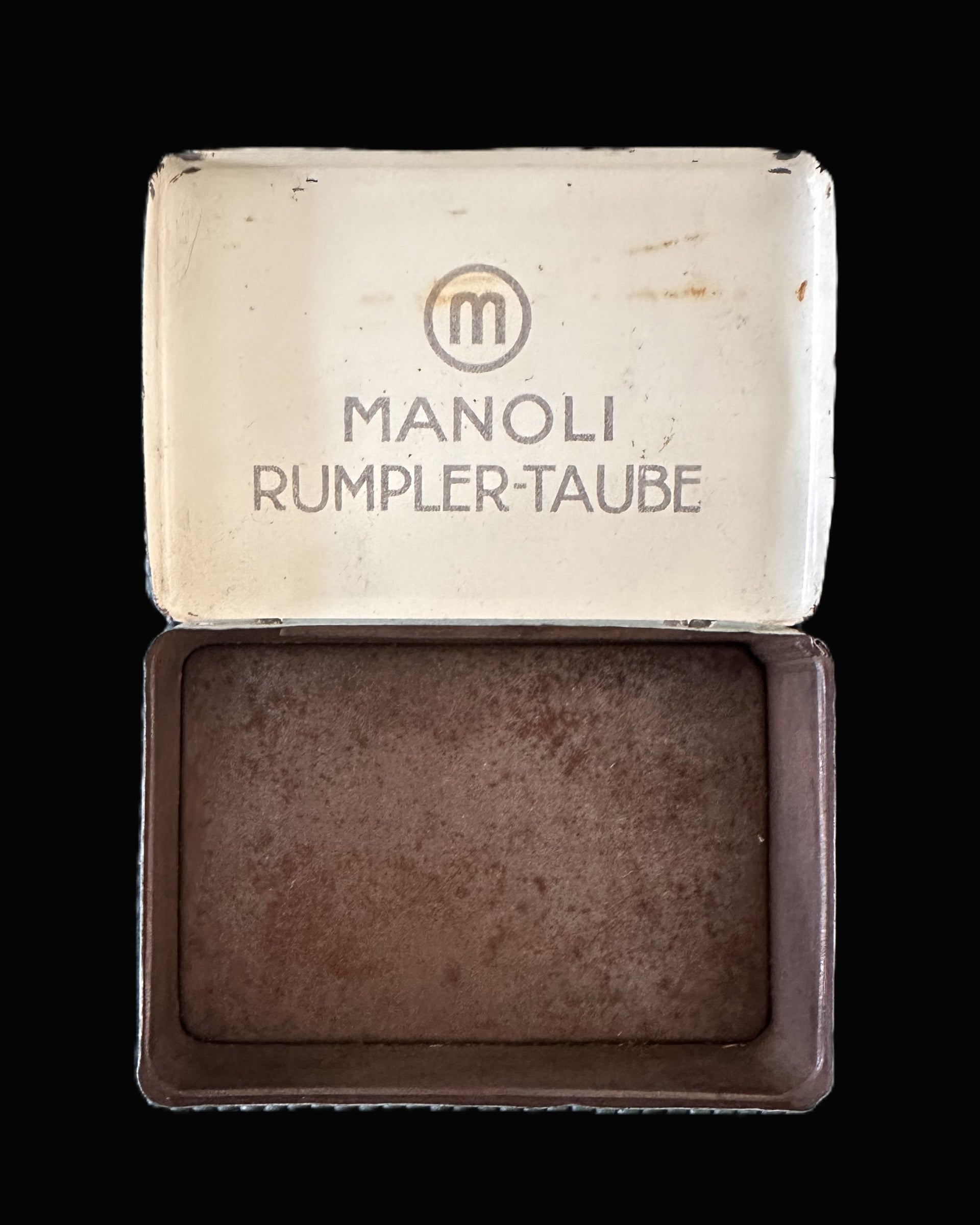 Manoli Rumpler-Taube cigarette tin – WWI-era aviation-themed German tobacco box