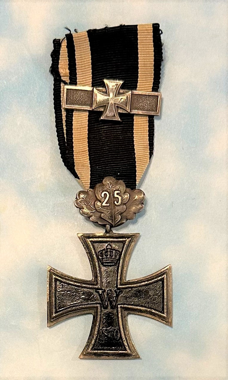 German 1870 Iron Cross 2nd class with 25 year oak leaves and 1914 Iron Cross 2nd class combination - Derrittmeister Militaria Group