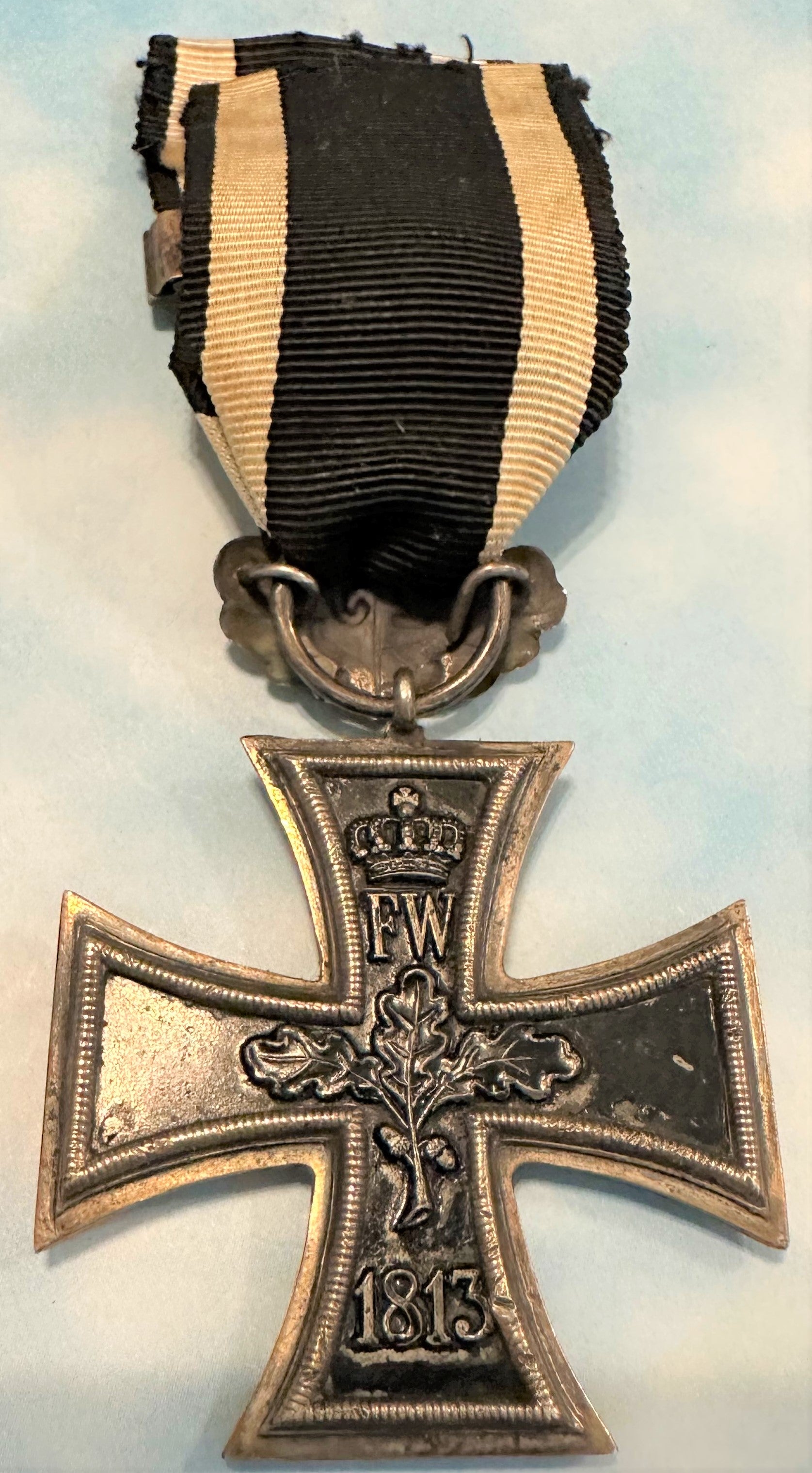 German 1870 Iron Cross 2nd class with 25 year oak leaves and 1914 Iron Cross 2nd class combination - Derrittmeister Militaria Group