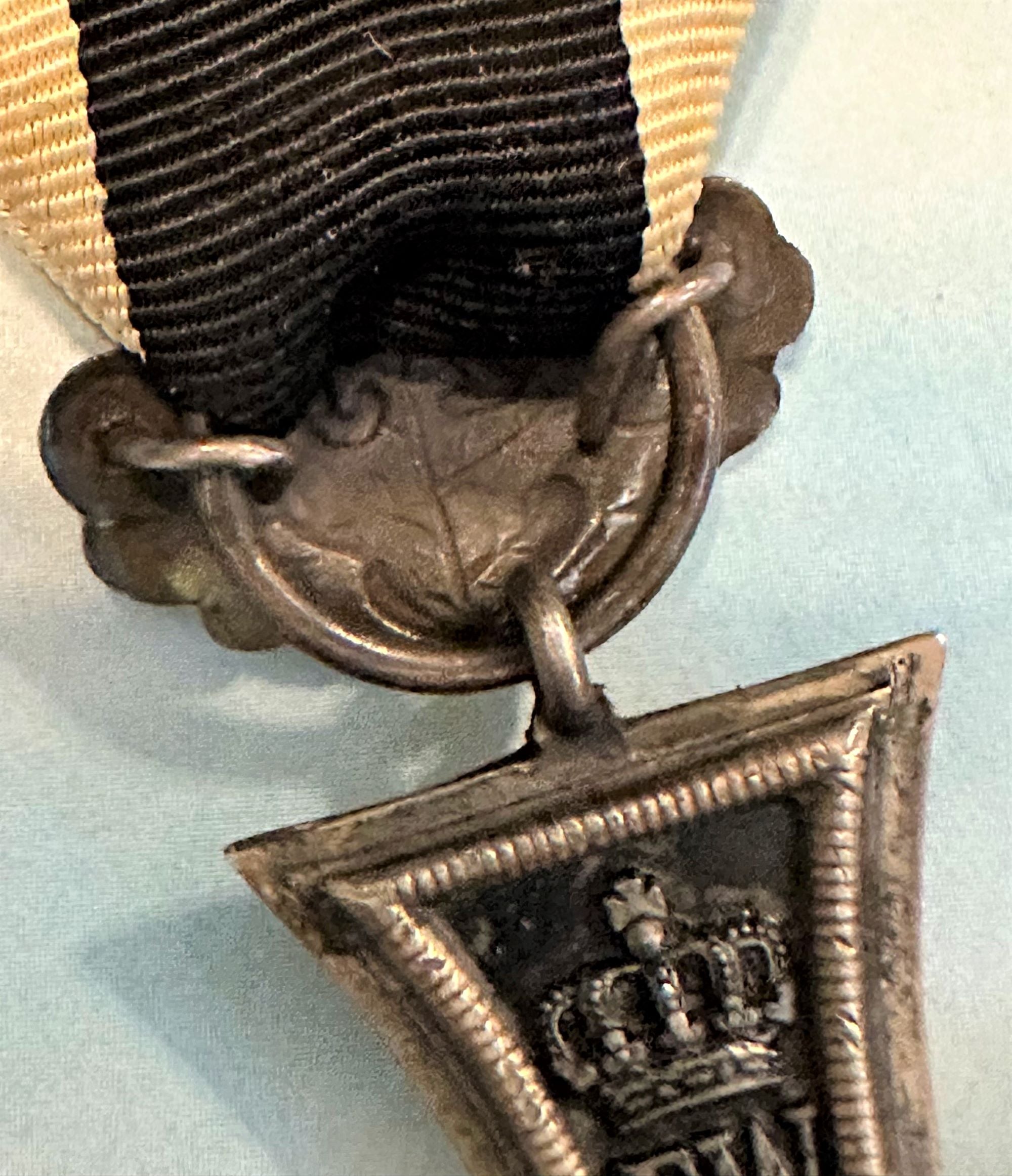 German 1870 Iron Cross 2nd class with 25 year oak leaves and 1914 Iron Cross 2nd class combination - Derrittmeister Militaria Group