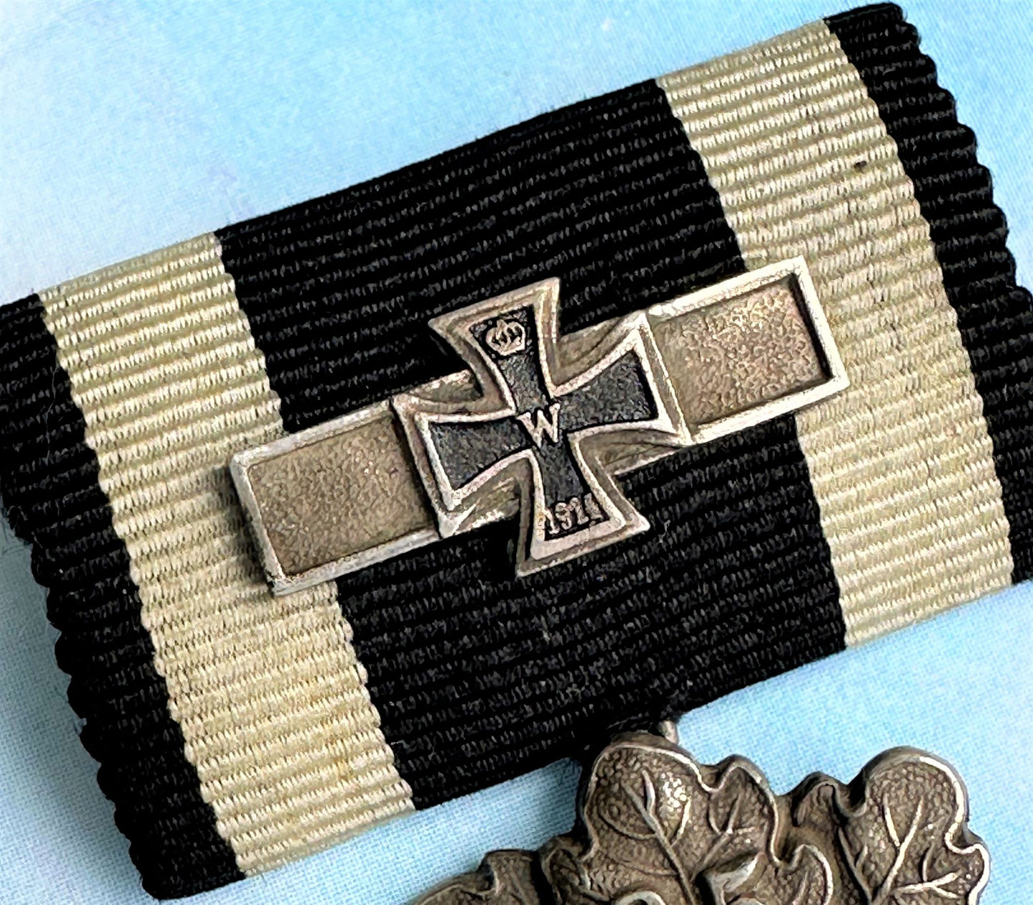 German Iron Cross Miniature 1870 2nd class with 25 year oak leaves and 1914 spange - Derrittmeister Militaria Group