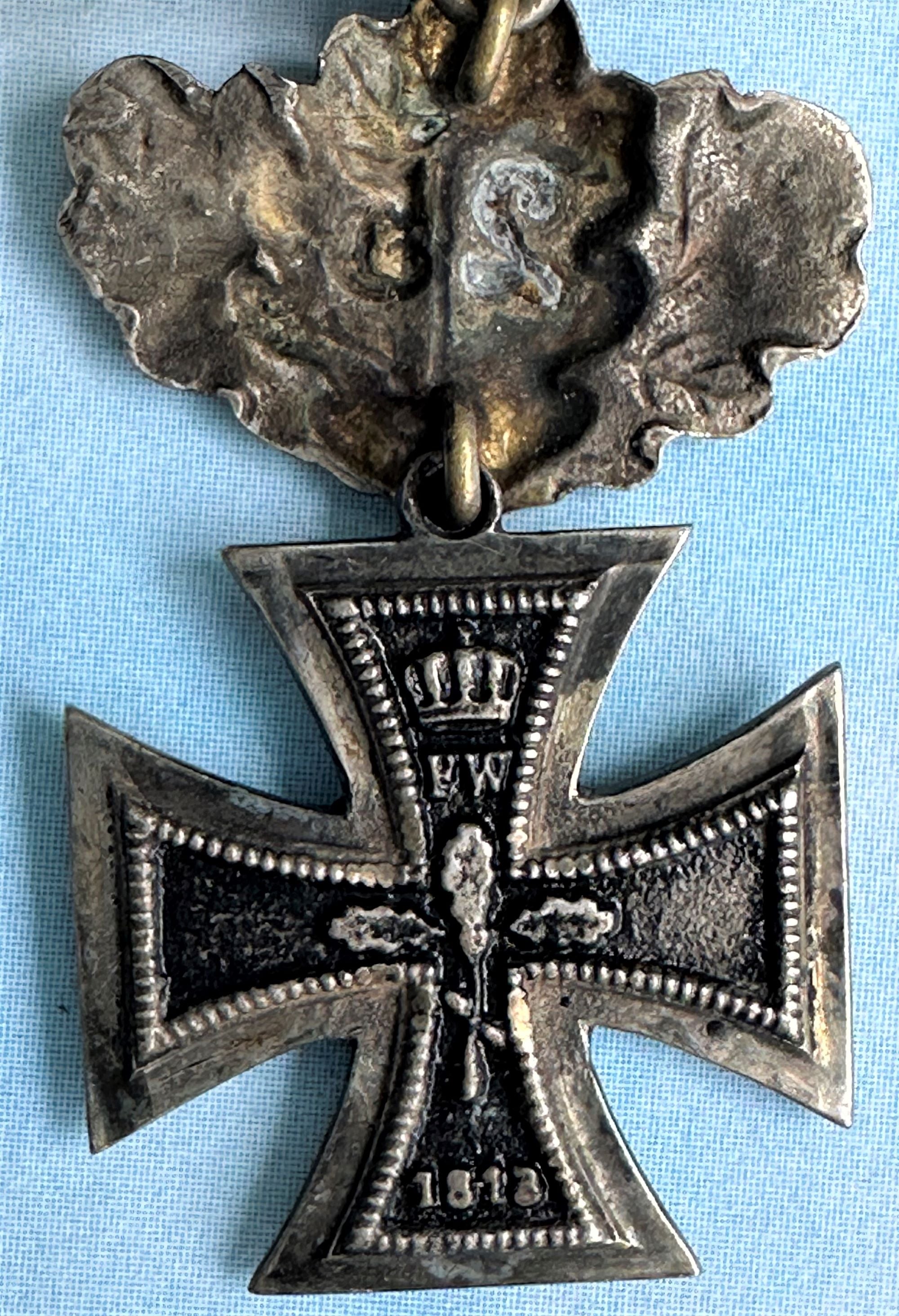 German Iron Cross Miniature 1870 2nd class with 25 year oak leaves and 1914 spange - Derrittmeister Militaria Group