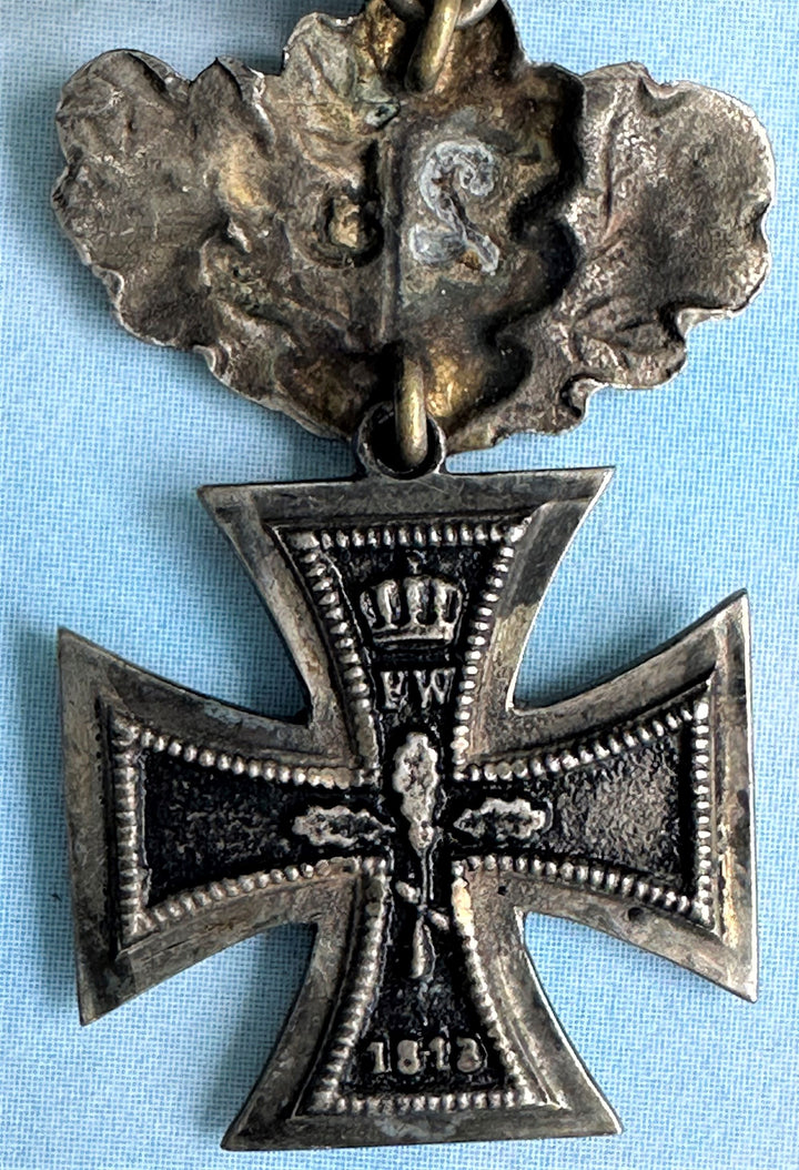 German Iron Cross Miniature 1870 2nd class with 25 year oak leaves and 1914 spange - Derrittmeister Militaria Group