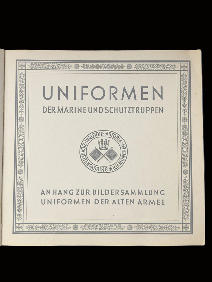 A vintage German military uniform booklet titled 'UNIFORMEN DER MARINE UND SCHUTZTRUPPEN' on aged beige paper, photographed flat against a blue background.