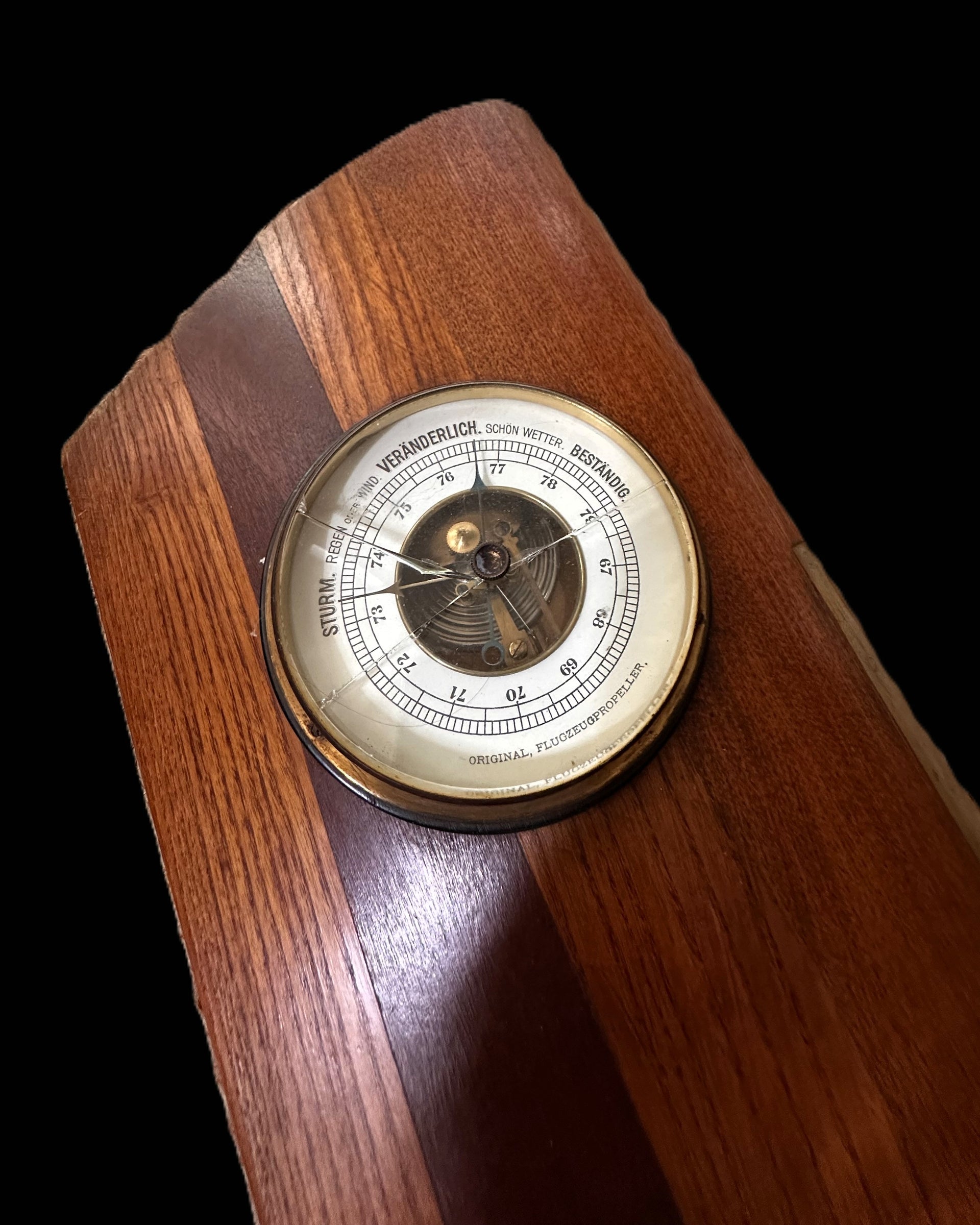 Wall-mounted weather station made from an original German aircraft propeller segment – with barometer and thermometer