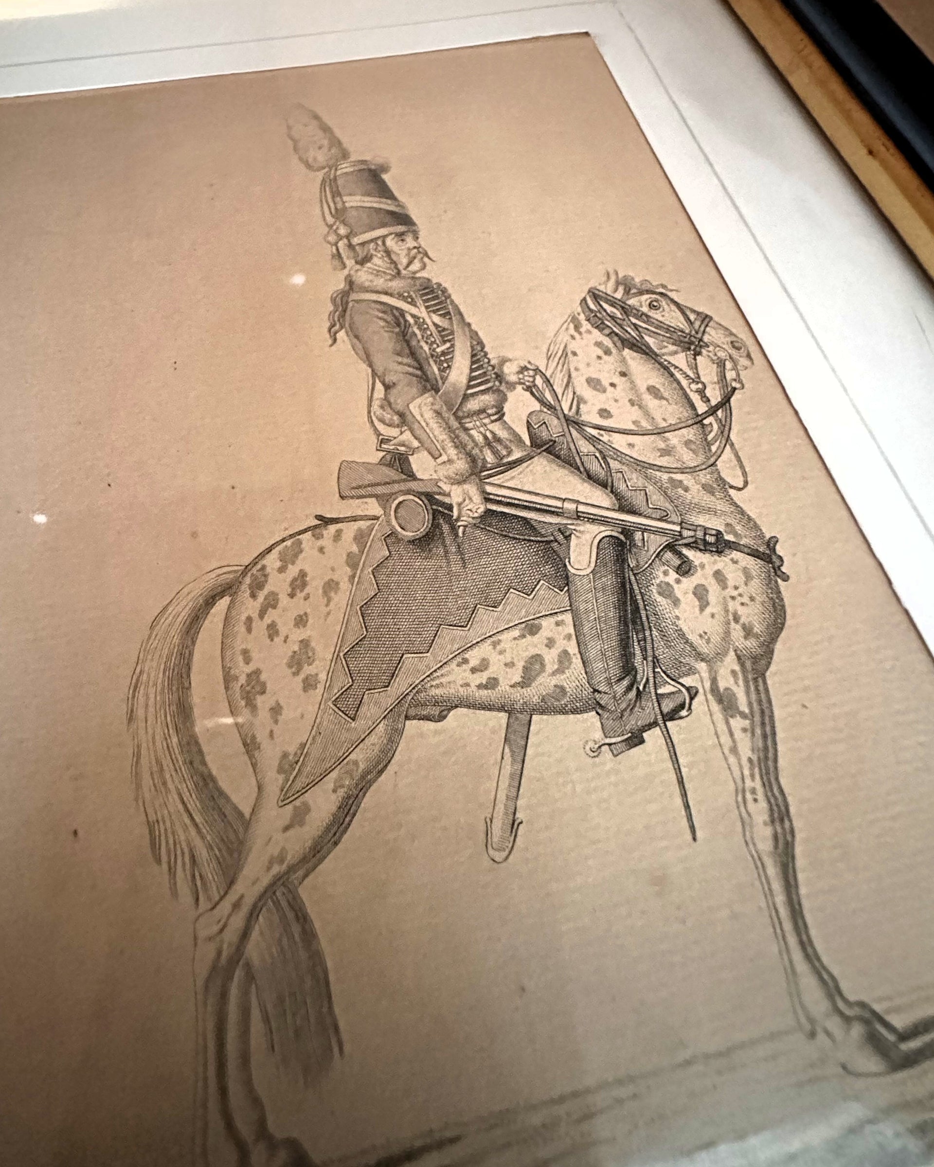 Framed pencil or lithograph-style portrait of a German cavalryman on horseback – possibly 19th-century Prussian Hussar