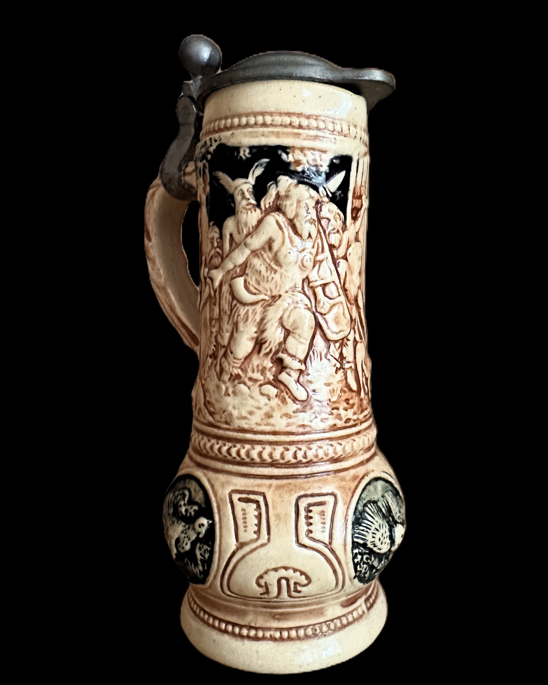 Antique German Beer Stein Featuring Mythological Reliefs and Pewter Lid