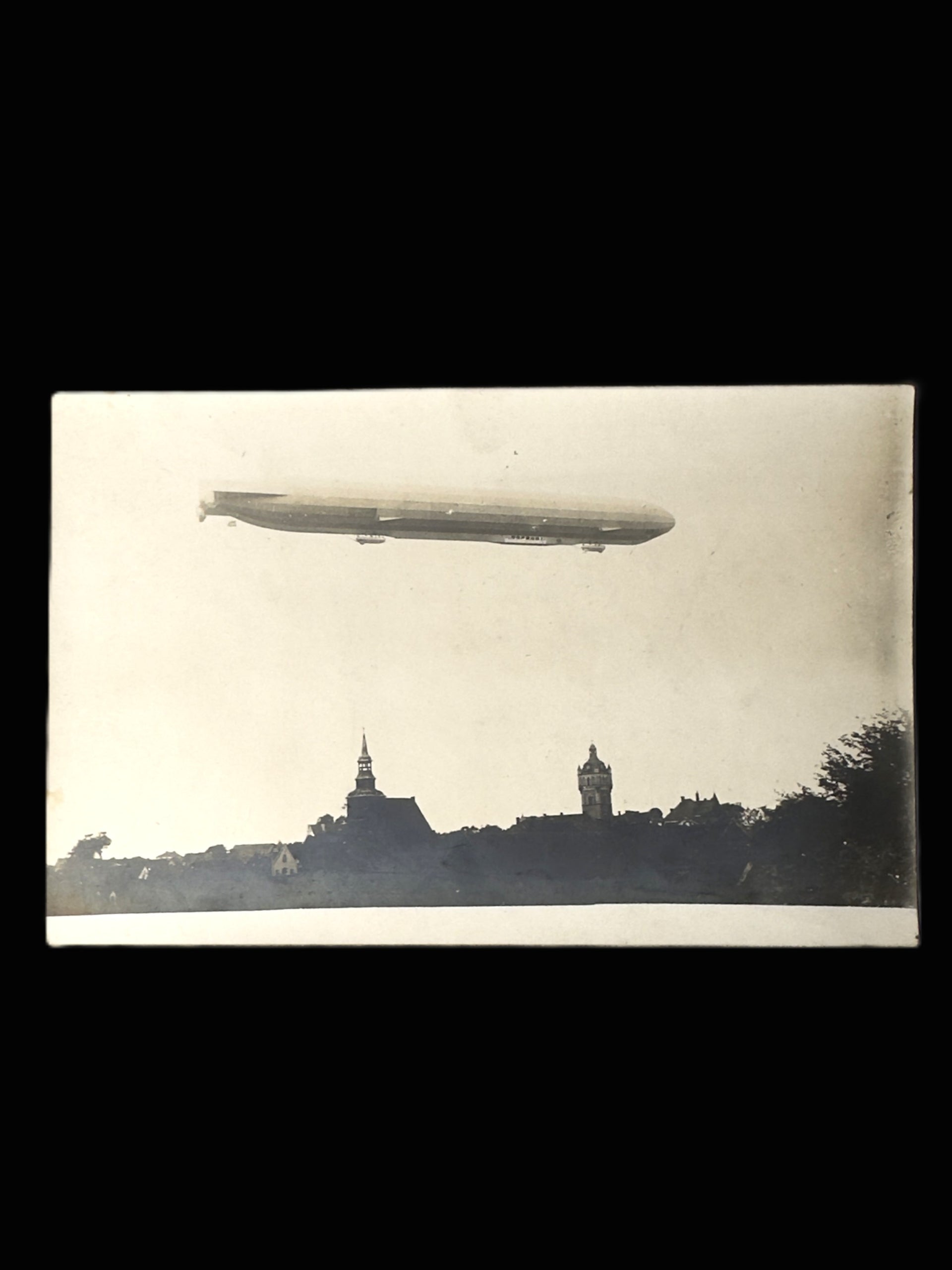 German Zeppelin over Historic City Real Photo Postcard